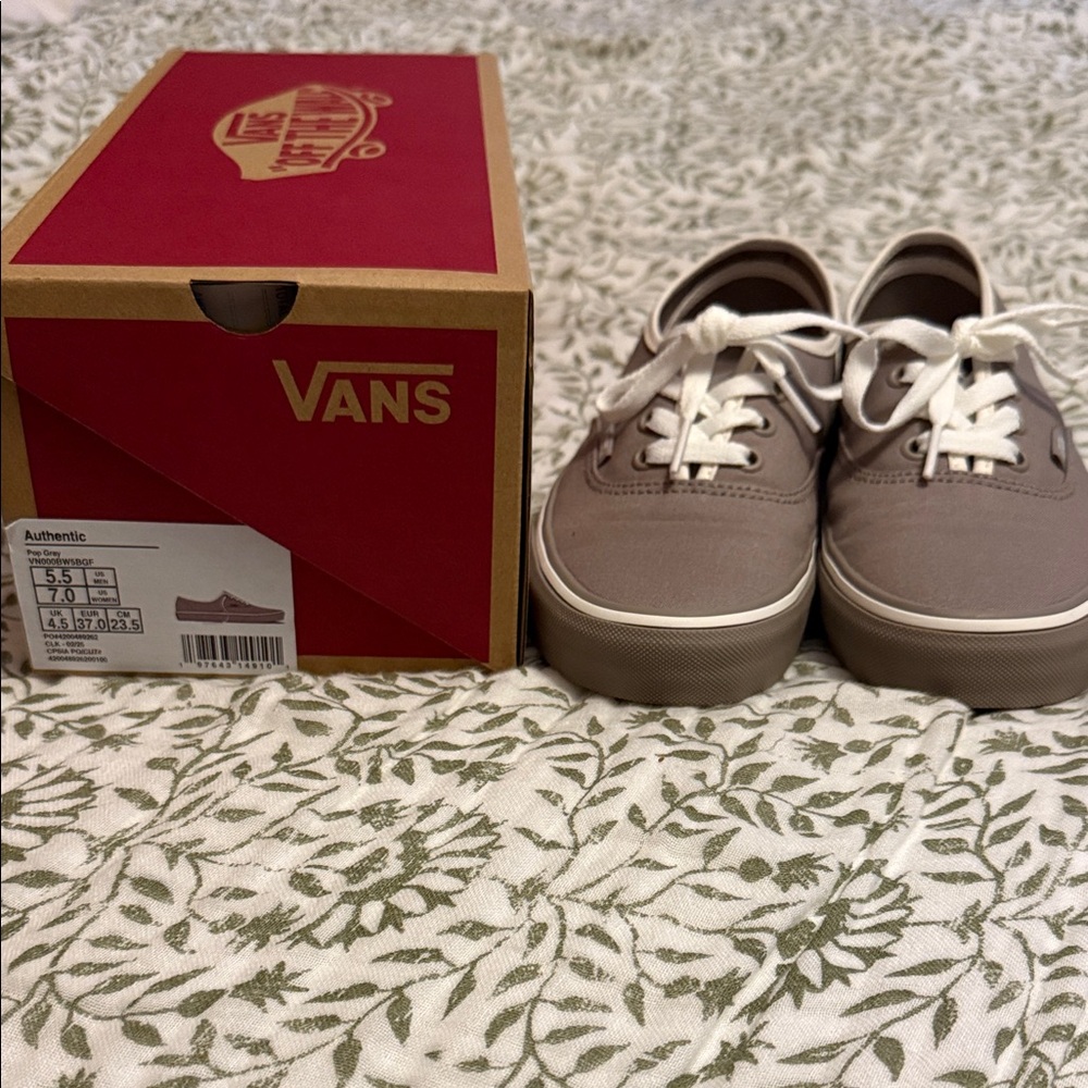 Vans Woman’s size 7. Grey with white trim.